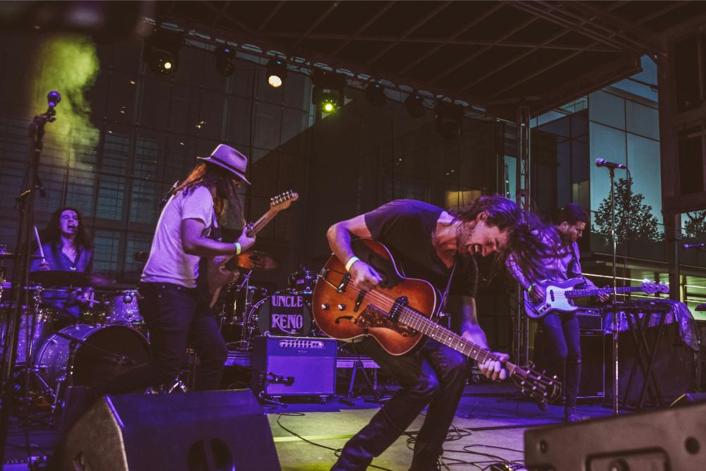 Energetic band performance on outdoor stage